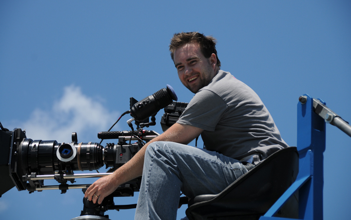 Andrzej Mrotek, Director of Deadly Closure checks out the RED ONE with the Cooke Techno 25 - 250 zoom mounted on a Matthews Tulip Crane